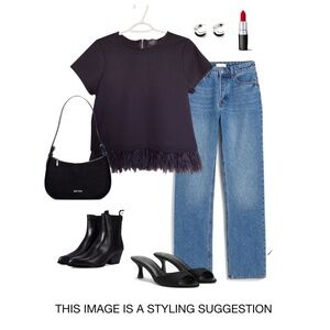 Black women’s top with feather trim